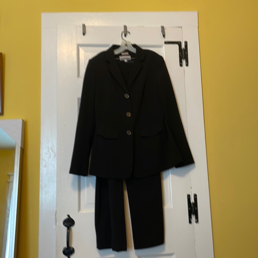 EUC Vintage Calvin Klein Size 6 Black Suit with silver buttons. Barely worn.